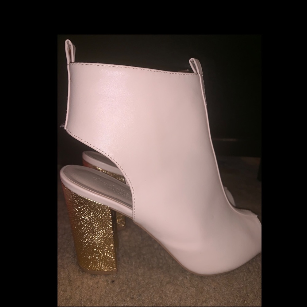 Fairly new peep toe half boot cut out heels.